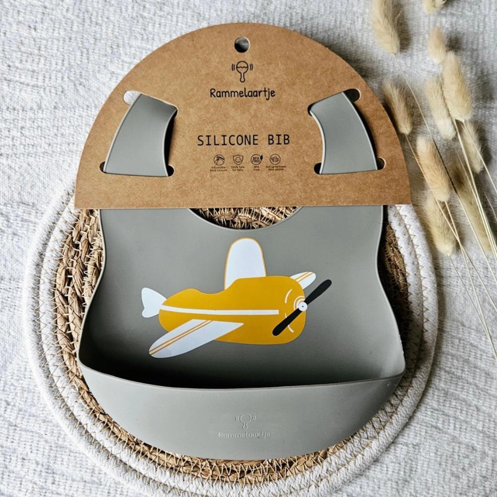Babete em Silicone Rammelaartje Sage Airplane Ochre Yellow